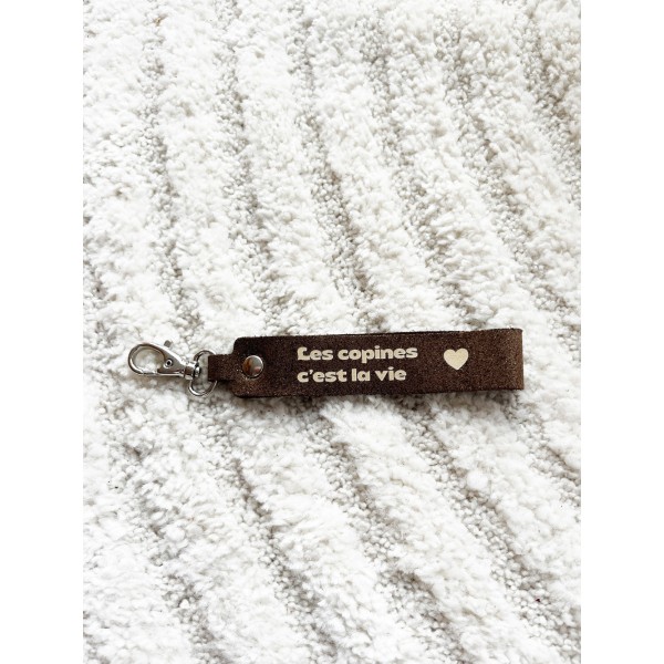 LA CARTABLIERE Porte-Clés Message Les Copines c’est la vie en Cuir Pailleté Chocolat doré.