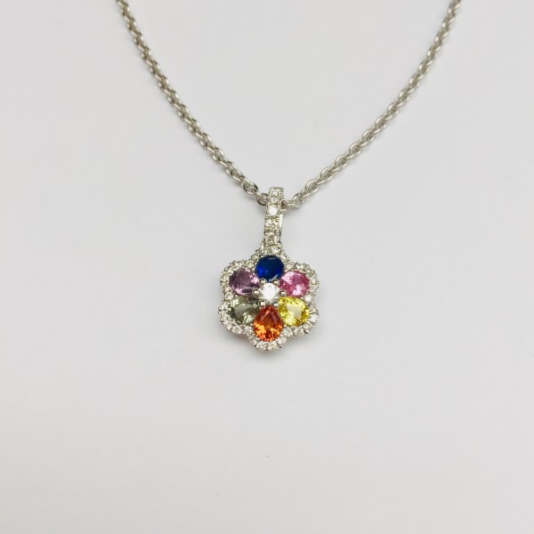 Pendentif fleur serti de saphirs multicolores et de brillants.
